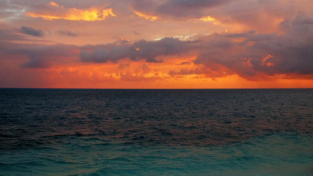Sunset ocean clouds boat beach free wallpaper for desktop - medium preview image