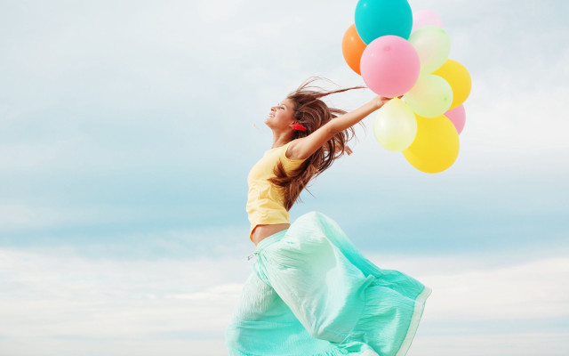 Woman balloons jumping summer vibrancy free wallpaper for desktop - medium preview image