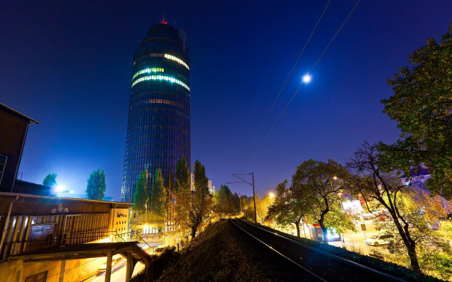 Tall building bright light night free wallpaper for desktop - medium preview image