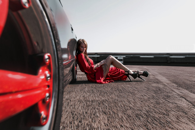 Woman red dress sitting car #2 free wallpaper for desktop - medium preview image