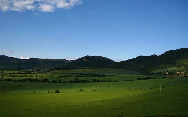 Green field mountains clouds sky free wallpaper for desktop - medium preview image