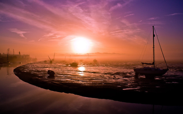 Boat water sunset foggy sky free wallpaper for desktop - medium preview image