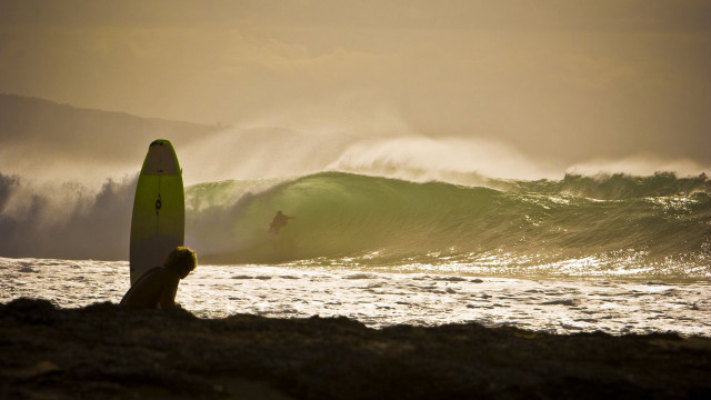 Beach person surfboard waves cloudy free wallpaper for desktop - medium preview image