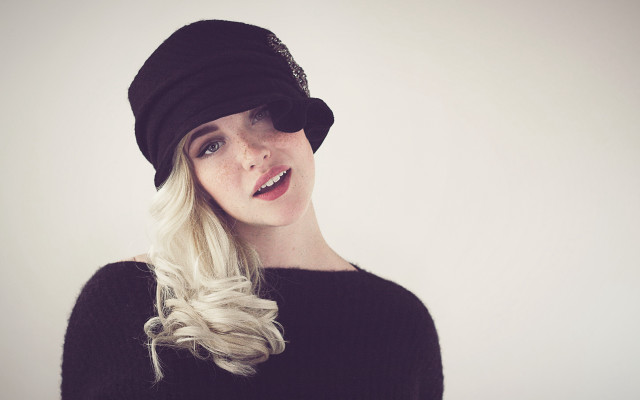 Woman hat black sweater portrait free wallpaper for desktop - medium preview image