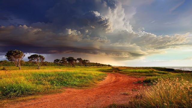 Dirt road field stormy sky free wallpaper for desktop - medium preview image