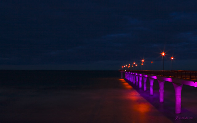 Long bridge night ocean fluorescent free wallpaper for desktop - medium preview image