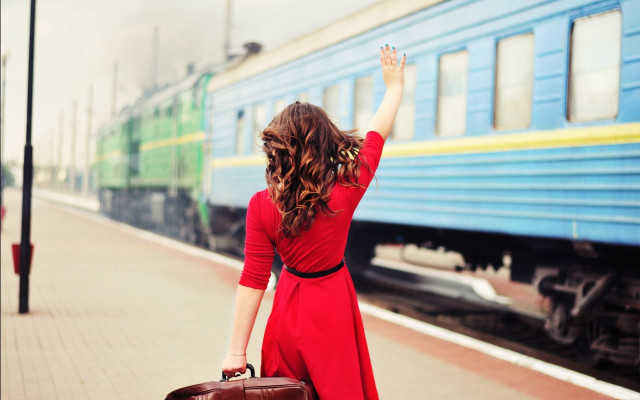 Woman red dress suitcase waving free wallpaper for desktop - medium preview image