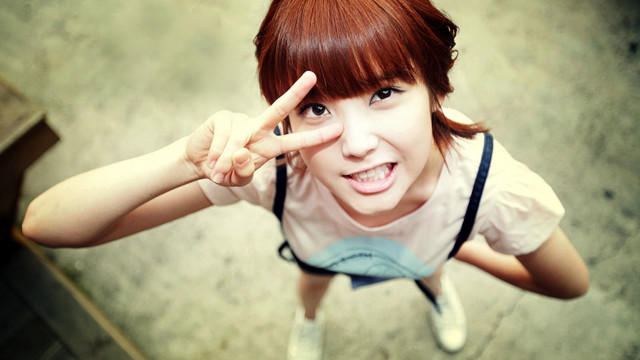 Woman peace sign standing sunny free wallpaper for desktop - medium preview image