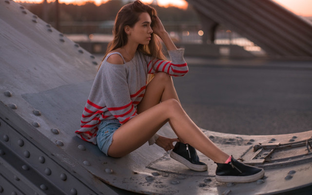 Woman sitting sunset denim fashion free wallpaper for desktop - medium preview image