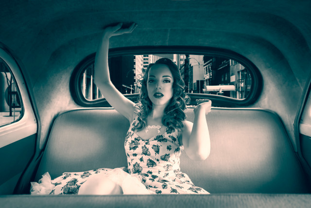 Woman waving in car fashion free wallpaper for desktop - medium preview image