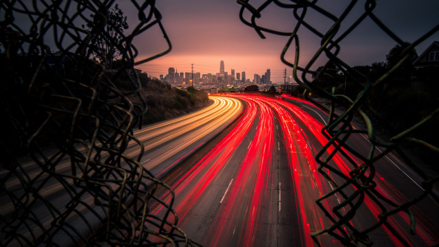 City skyline fence light streaks free wallpaper for desktop - medium preview image