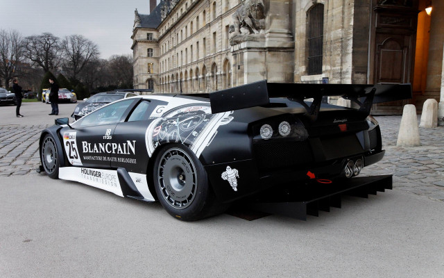 Car large rear clocktower building free wallpaper for desktop - medium preview image