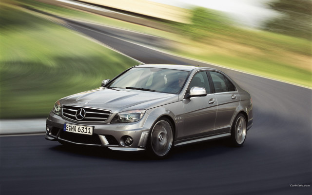 Silver car green field hillside free wallpaper for desktop - medium preview image