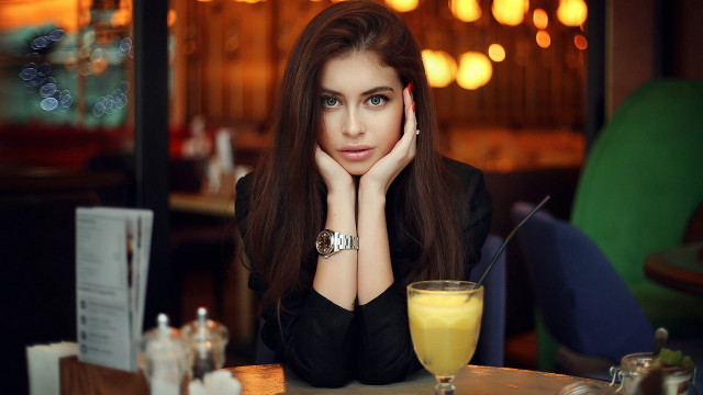 Woman sitting table orange juice #2 free wallpaper for desktop - medium preview image