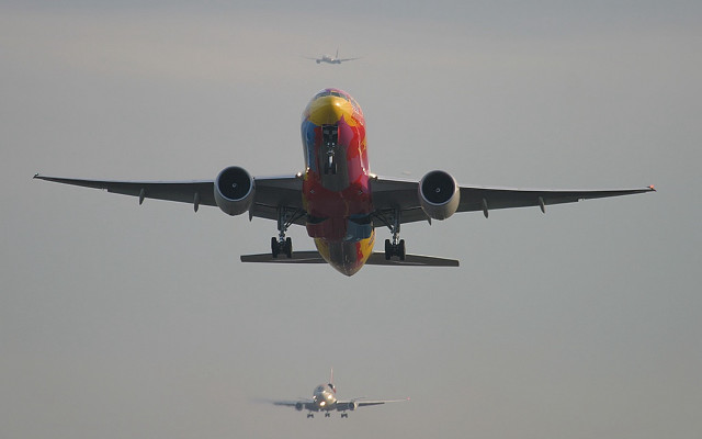 Large jetliner cloudy sky airport free wallpaper for desktop - medium preview image