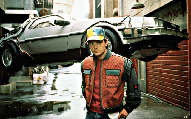 Man car upside down building free wallpaper for desktop - medium preview image