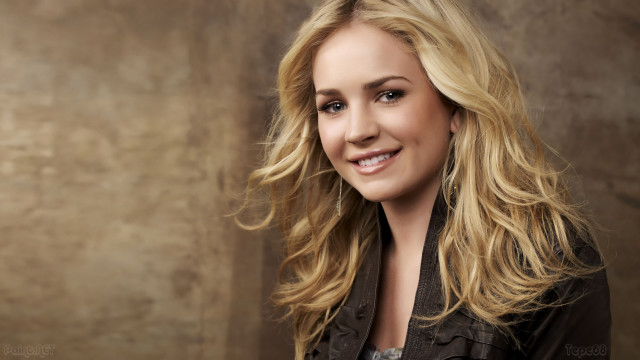 Blonde woman smiling blackjacket portrait free wallpaper for desktop - medium preview image