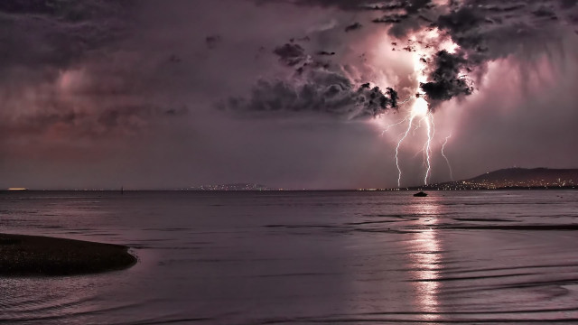 Lightning ocean city boat night free wallpaper for desktop - medium preview image