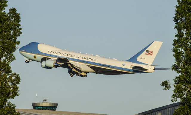 Jetliner blue sky trees building free wallpaper for desktop - medium preview image