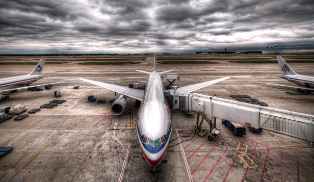 Large jetliner tarmac cloudy sky free wallpaper for desktop - medium preview image