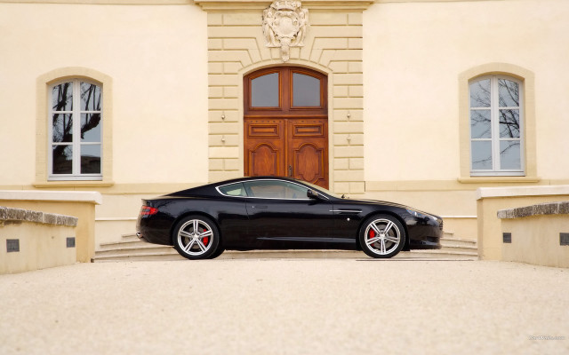 Black sports car neoclassicism building free wallpaper for desktop - medium preview image