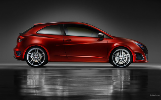 Red car dark room reflective free wallpaper for desktop - medium preview image