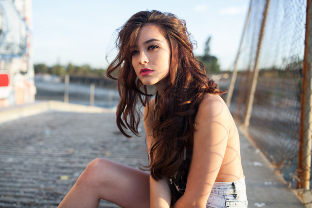 Woman bench crossed portrait city free wallpaper for desktop - medium preview image