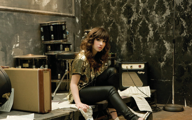 Woman sitting suitcase recordplayer room free wallpaper for desktop - medium preview image