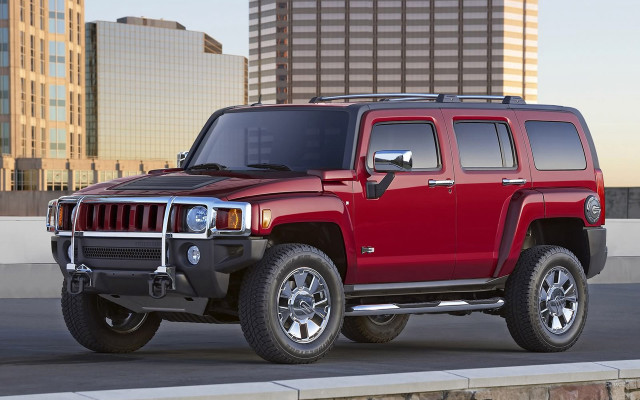 Red hummer truck city skyline free wallpaper for desktop - medium preview image