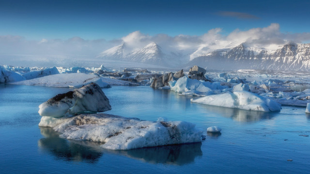 Snowy mountains ice covered water free wallpaper for desktop - medium preview image