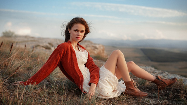 Woman hill sitting boots dress free wallpaper for desktop - medium preview image