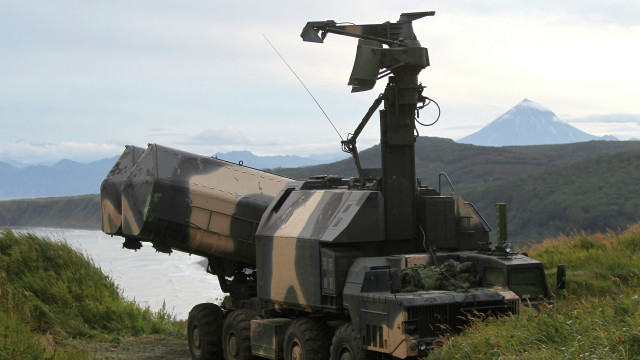 Military vehicle grassy lake mountains free wallpaper for desktop - medium preview image