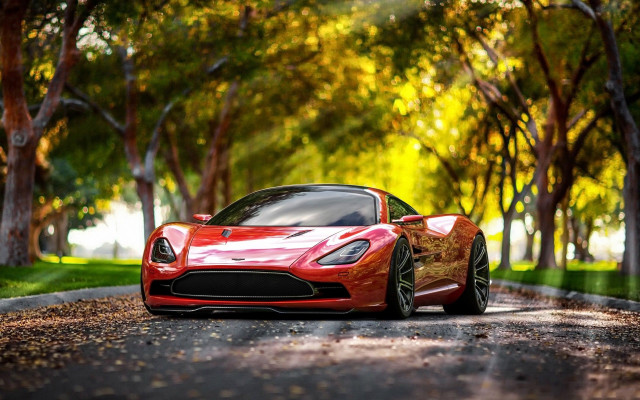 Red sports car autumn park free wallpaper for desktop - medium preview image