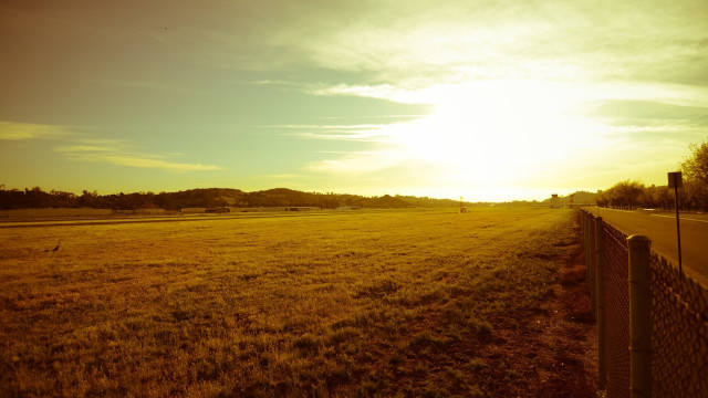 Sunset ocean beach fence road free wallpaper for desktop - medium preview image