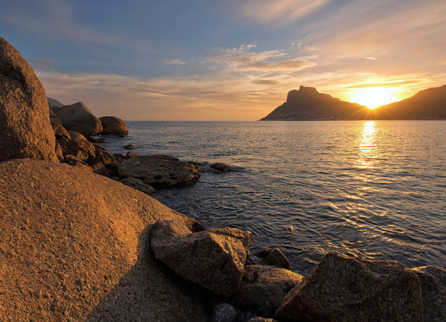 Sunset water rocks mountains orange free wallpaper for desktop - medium preview image