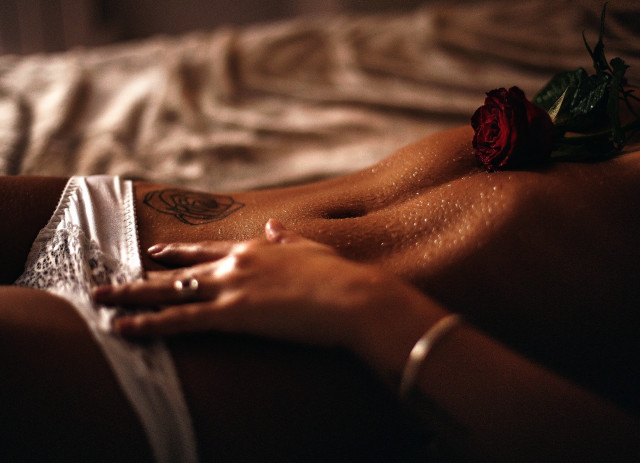 Woman rose tattoo blurry closeup free wallpaper for desktop - medium preview image