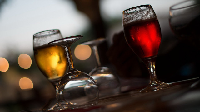 Three glasses wine bottle blurry free wallpaper for desktop - medium preview image