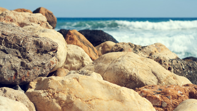 Rocks water waves beach mountains free wallpaper for desktop - medium preview image