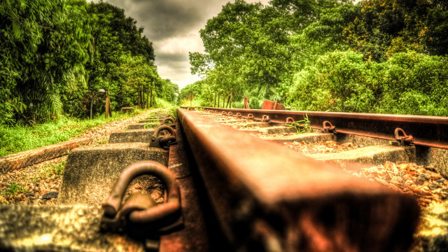 Rusted railway trees cloudy sky free wallpaper for desktop - medium preview image