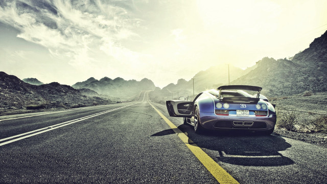 Mountain road sports car cinematic free wallpaper for desktop - medium preview image