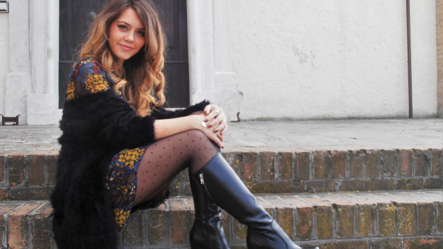 Woman sitting fur coat polka free wallpaper for desktop - medium preview image