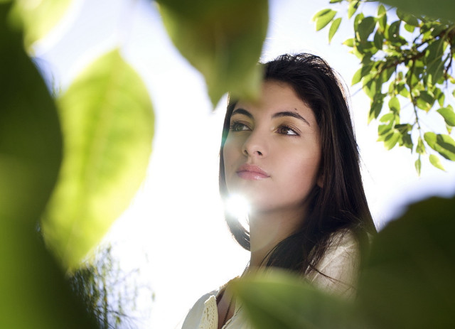 Woman sky leaves light bokeh free wallpaper for desktop - medium preview image