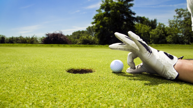 Golf ball gloves green field free wallpaper for desktop - medium preview image