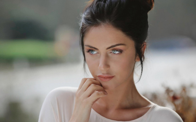 Woman bun white shirt blue #3 free wallpaper for desktop - medium preview image