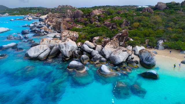 Beach rocks water people trees free wallpaper for desktop - medium preview image