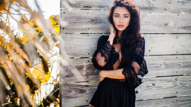 Woman black dress autumn fire free wallpaper for desktop - medium preview image