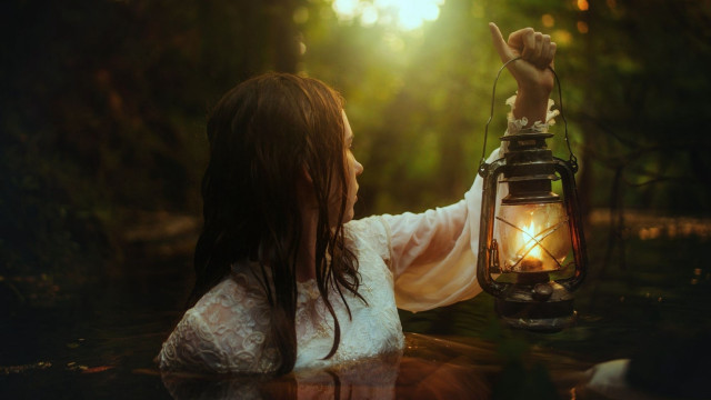 Woman lantern water sunlight hand free wallpaper for desktop - medium preview image