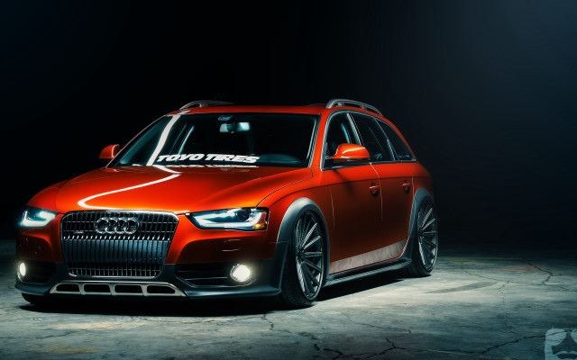 Red car white arrow headlights free wallpaper for desktop - medium preview image