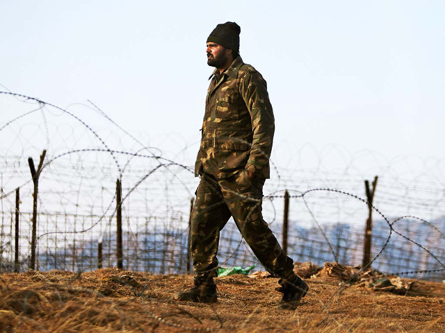 Man camouflage barbed wire fence free wallpaper for desktop - medium preview image