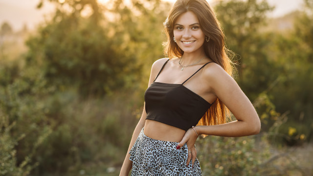 Woman leopard pants woods sunset free wallpaper for desktop - medium preview image